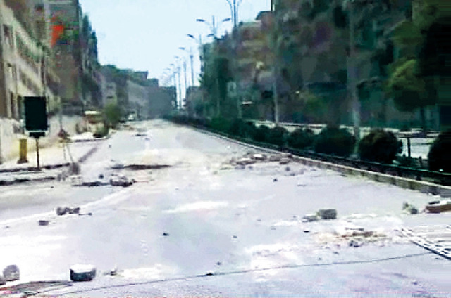 "حماة وقد بدت كمدينة أشباح (ا.ب)"