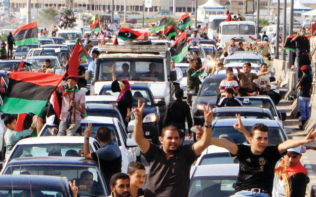 الغرب يرحب بطي صفحة العقيد