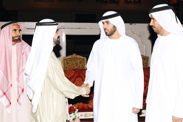 "..وسموه يصافح العريس بحضور والده"