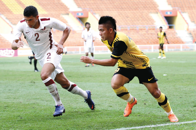 "جانب من مباراة الأولمبي القطري وماليزيا"