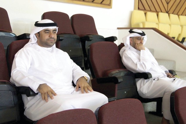 "عبد الله بشر\"يسار\"ومحمد العامري خلال حضورهما للبطولة"