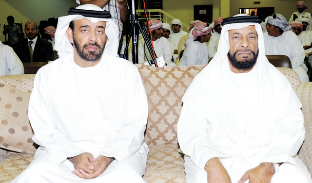 "مع نجله سالم عضو المجلس الوطني الاتحادي"
