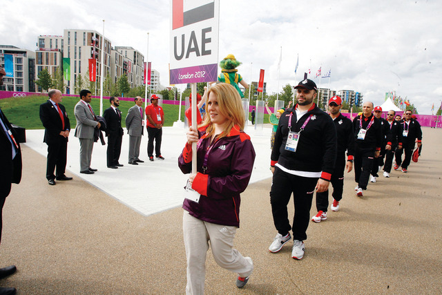 "من مراسم رفع العلم الإماراتي في القرية الأولمبية"
