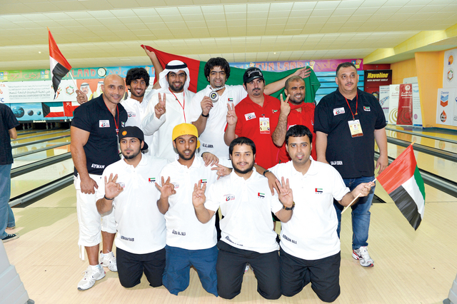 "صورة جماعية للأبطال على منصة التتويج من المصدر"