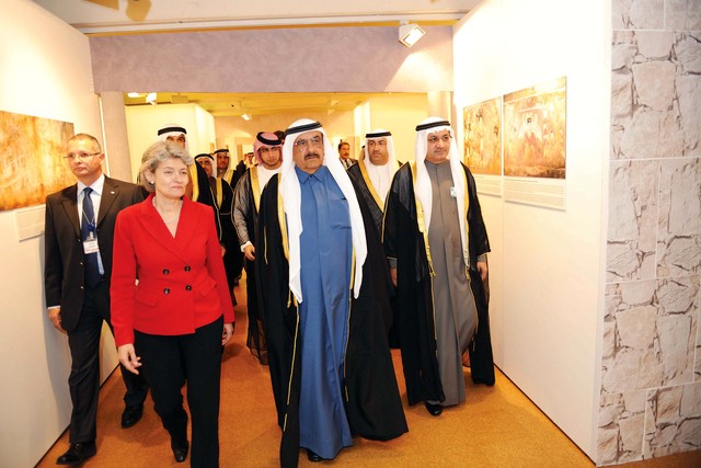 "سموه وبوكوفا خلال افتتاح المعرض"