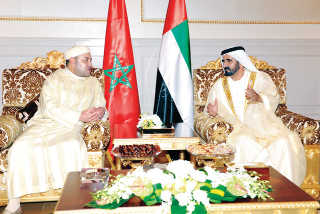 "محمد بن راشد لدى استقباله الملك محمد السادس"