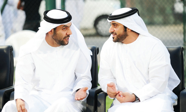 "عبد الله بن محمد وعبد الله النابودة خلال متابعتهما مباراة الأهلي والعين\t\tمن المصدر"
