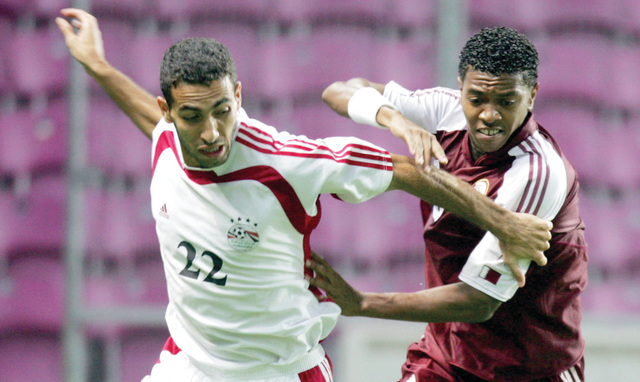 "من مباراة سابق بين مصر و قطر \t ارشيفيه"