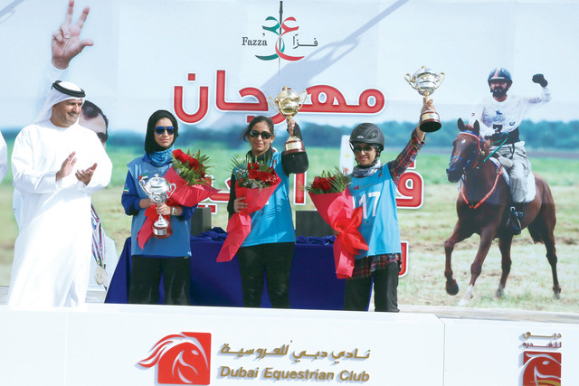 "البطلة فطيم على منصة التتويج"