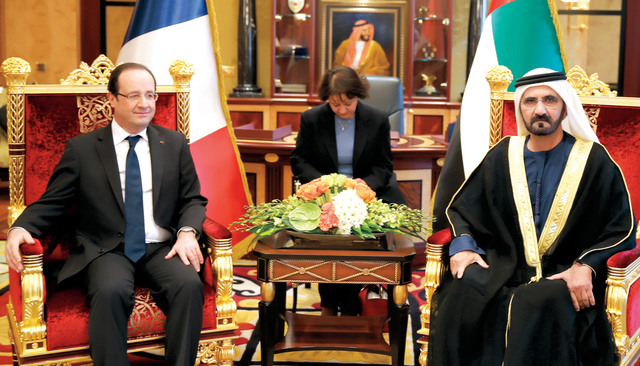 "محمد بن راشد لدى لقائه هولاند"