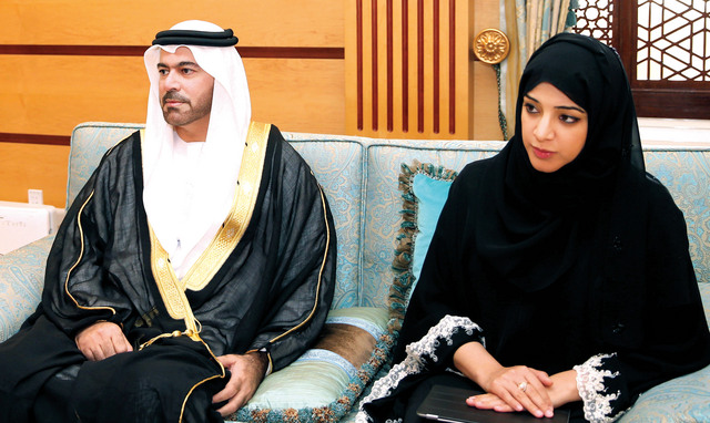 "ريم الهاشمي ومحمد القرقاوي خلال اللقاء"