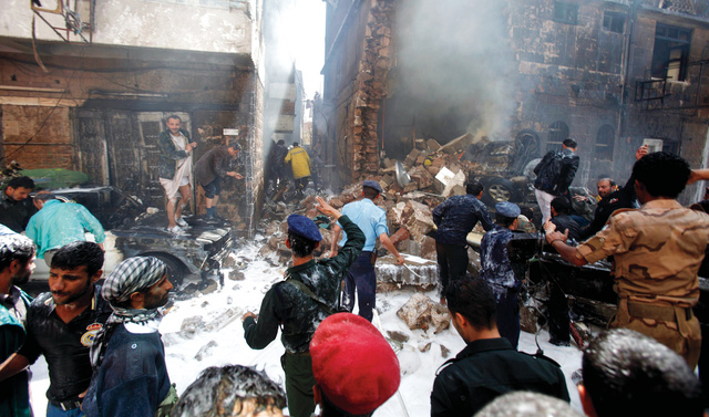 "فرق الإسعاف و الدفاع المدني في موقع تحطم الطائرة تخمد الحريق\t\t\t\t\t (أي.بي ايه"