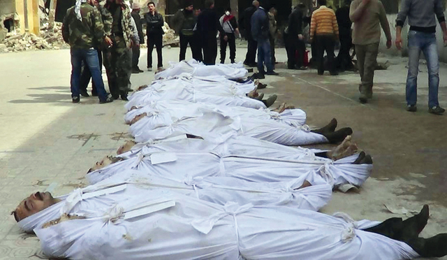 "جثث سوريين تم سحبها من نهر قويق في حلب يقول الناشطون أنهم قضواعلى أيدي شبيحة نظام الأسد   \tأ.ب"