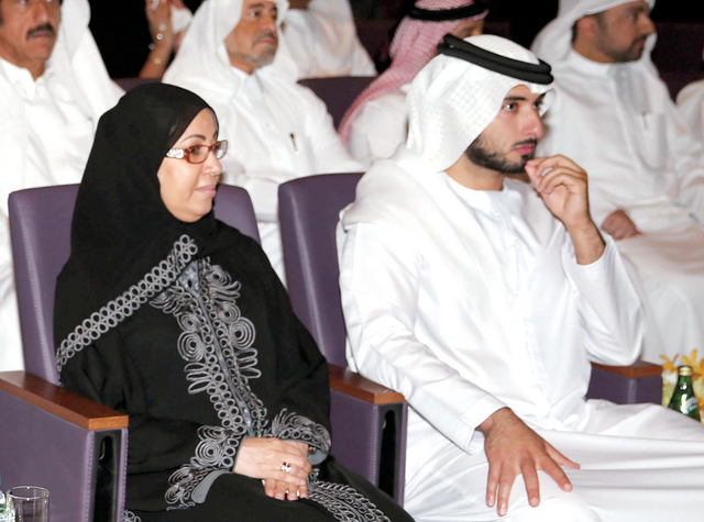 "ماجد بن محمد ومريم الرومي خلال حفل الافتتاح"