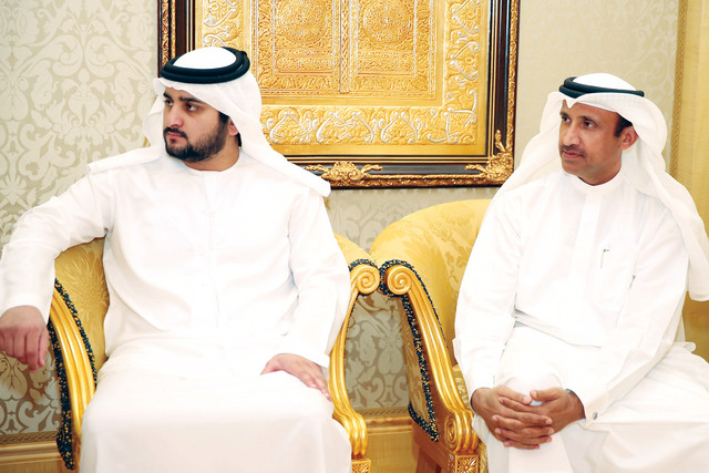 "مكتوم بن محمد ومحمد الشيباني خلال اللقاء"