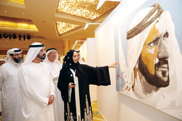 "..وسموه يطالع رسماً لسموه بحضور عبدالغفار حسين وسامي قرقاش ومنال تريم"