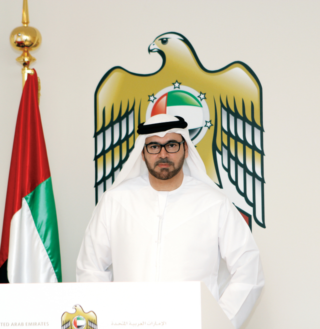"محمد القرقاوي متحدثاً للإعلاميين"