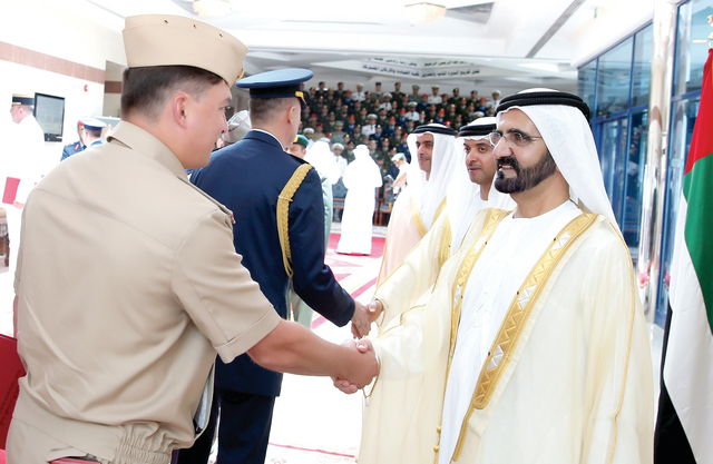 "..وسموه يصافح خريجاً من دولة صديقة"