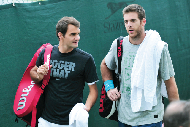 "السويسري روجيه فيدرر يتوجه إلى مرانه الختامي قبل انطلاق ويمبلدون \tأ ف ب"