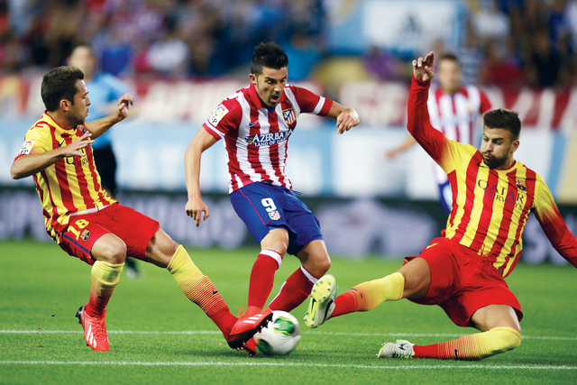 اتلتيكو مدريد يجبر برشلونة على التعادل