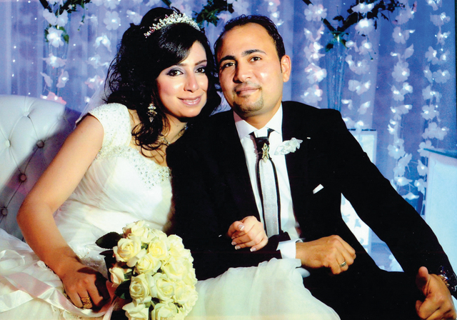 "العروسان حسام ونجوى"