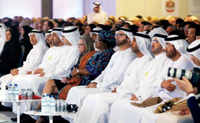 "محمد القرقاوي وراشد بن فهد وعبد الله الطريفي ومحمد الشحي خلال افتتاح أعمال القمة أمس في أبوظبي\t تصوير - مجدي اسكندر"