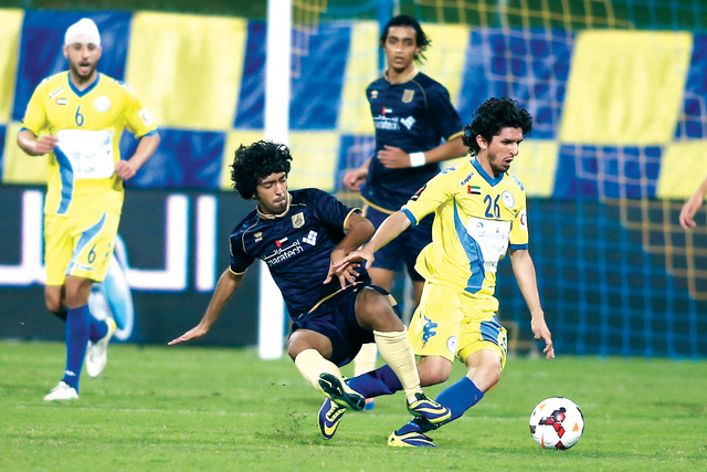 "مواجهة قوية جمعت الظفرة مع دبي\t\tتصوير - مجدي اسكندر"