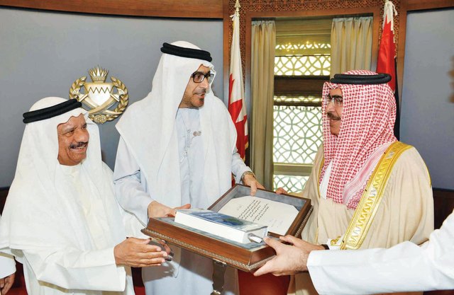 "..ويهدي الكتاب لوزير داخلية البحرين"