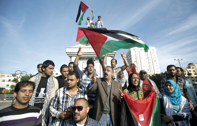 "جانب من الاحتفالات في غزة ابتهاجاً بالاتفاق\tأ.ف.ب"