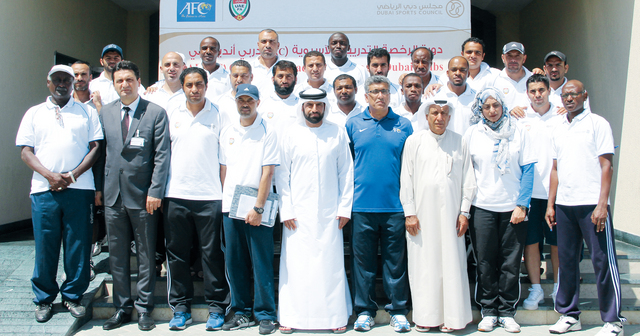 "المدربون بعد ختام الدورة \t البيان"