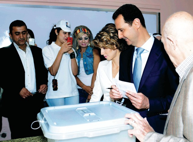 "بشار يدلي بصوته أ.ب"