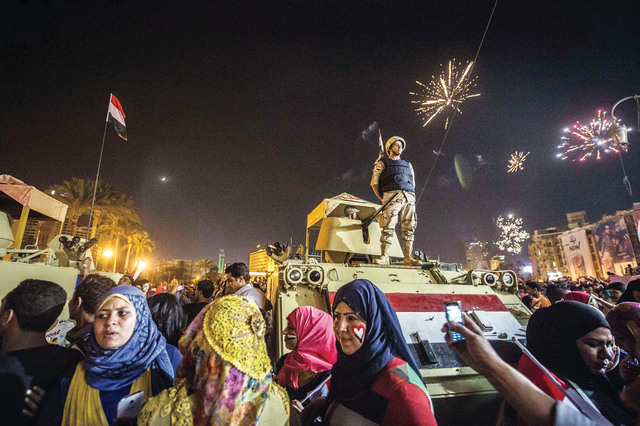 "احتفالات في ميدان التحرير بالقاهرة \t أ.ف.ب"