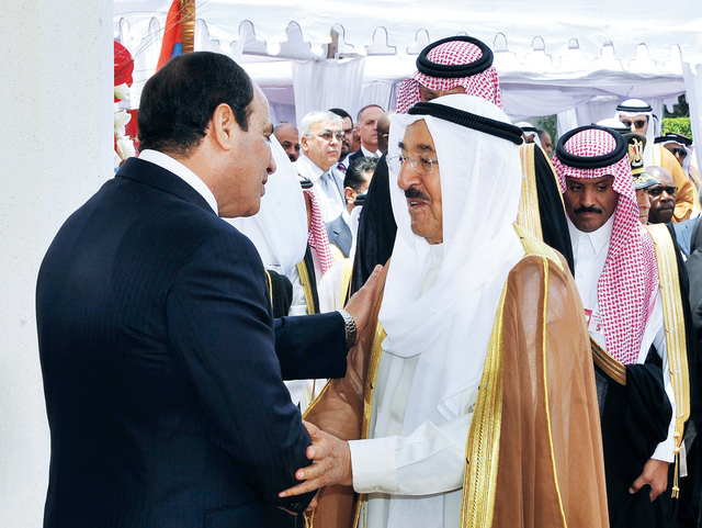 "..ويتلقى التهنئة من أمير الكويت الشيخ صباح الأحمد الصباح\tأ.ب"
