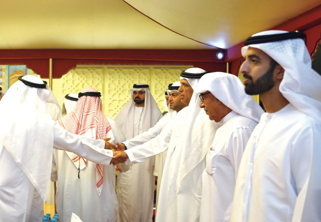 "سعود بن صقر خلال استقباله المهنئين بحضور ولي عهد رأس الخيمة\tوام"