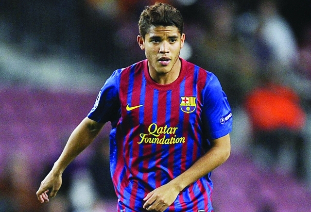 "BARCELONA, SPAIN - DECEMBER 06: Jonathan dos Santos of FC Barcelona runs with the ball during the UEFA Champions League group H match between FC Barcelona and FC BATE Borisov at Camp Nou on December 6, 2011 in Barcelona, Spain. FC Barcelona won 4-0. (Photo by David Ramos/Getty Images)"