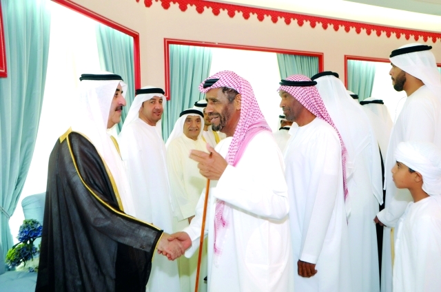 "حاكم أم القيوين خلال استقباله المهنئين بالعيد"