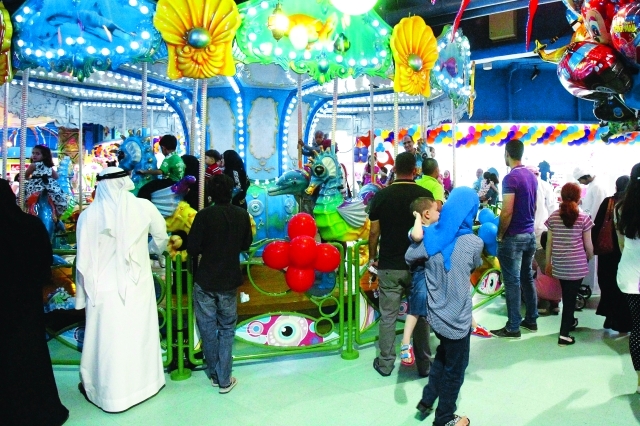 "مدن الملاهي وفرحة الأطفال"