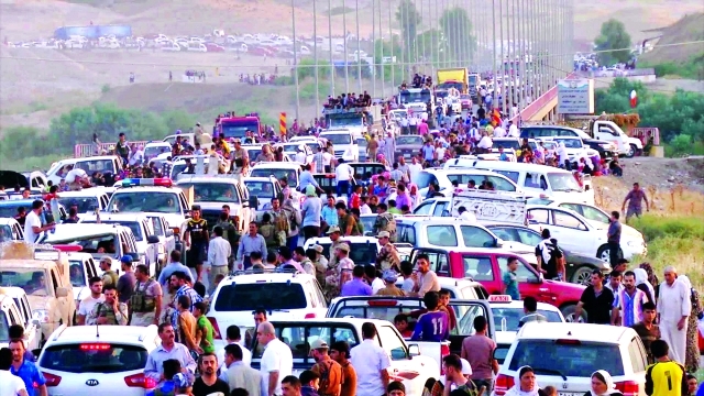 "طوفان بشري على أبواب إقليم كردستان هرباً من فظائع «داعش»"