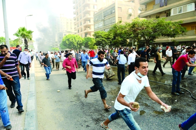 "الشعب المصري واجه عنف الجماعة الإرهابية موحداً \tأرشيفية"