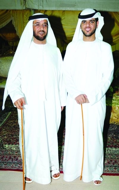 "العريس عبدالله الكتبي ووالده سلطان"