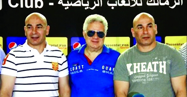 "مرتضى منصور بين التوأم حسن من المصدر"
