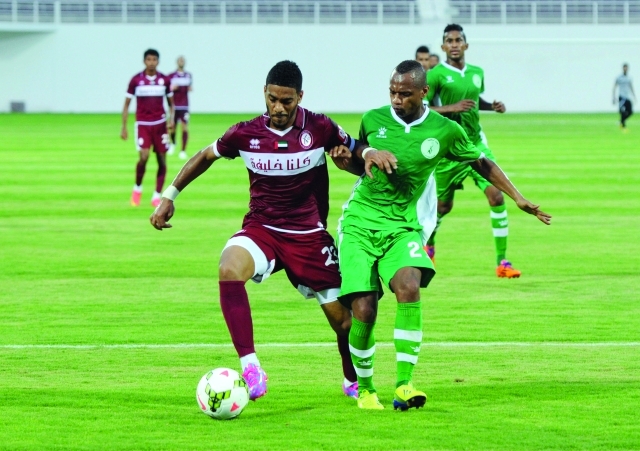 "لقطة من مباراة الوحدة والنهضةالبيان"