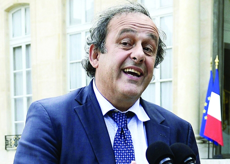 "UEFA President Michel Platini answers journalists' questions on September 11, 2014 at the Elysee Palace in Paris, after attending a lunch with the French president in preparation for the upcoming 2016 Euro Cup. AFP PHOTO / STEPHANE DE SAKUTIN"