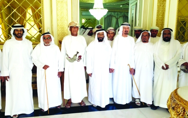 "أحمد خليفة السويدي ومحمد بالركاض العامري يتوسطان عدداً من المسؤولين"