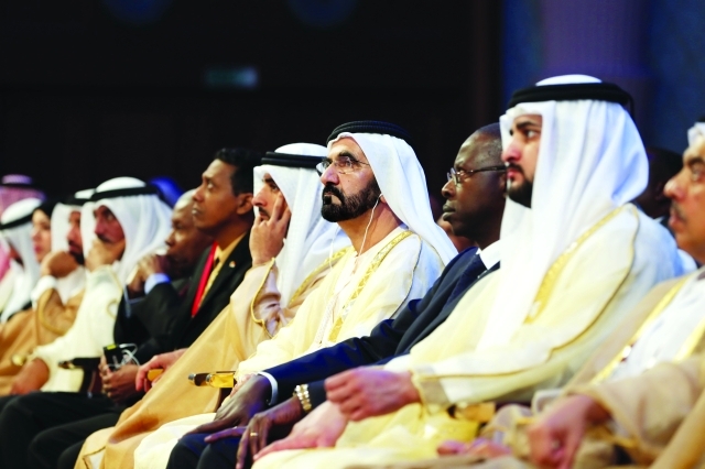 "محمد بن راشد يستمع إلى فعاليات الجلسة الافتتاحية بحضور حمدان بن محمد ومكتوم بن محمد"