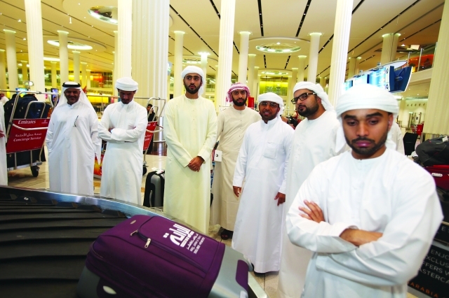 "الحجاج لدى وصولهم أرض البلاد بعد أداء مناسك الحج"