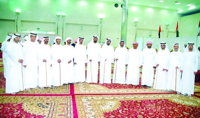 "العريسان مسلم وعلي التميمي وعدد من الأصدقاء والأقارب"
