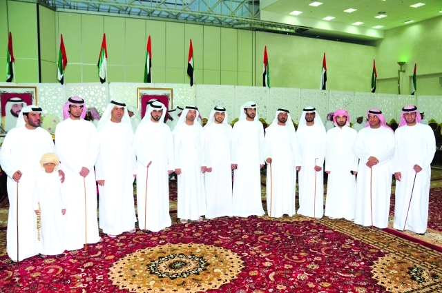 "العريسان مسلم وعلي التميمي وعدد من الأهل والأصدقاء"