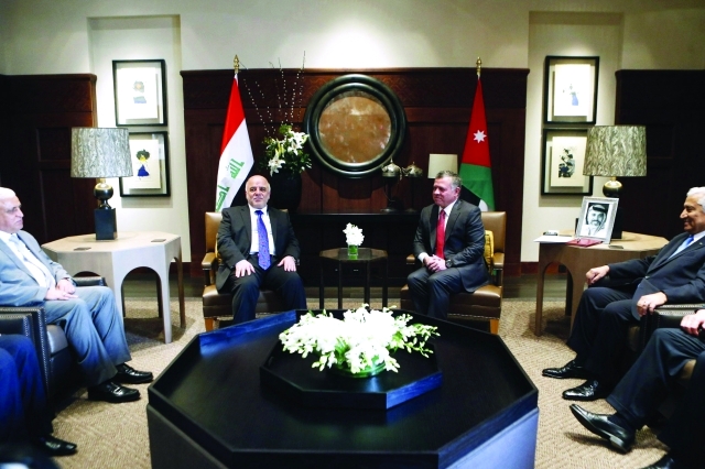 "العاهل الأردني مستقبلاً العباديأ.ف.ب"