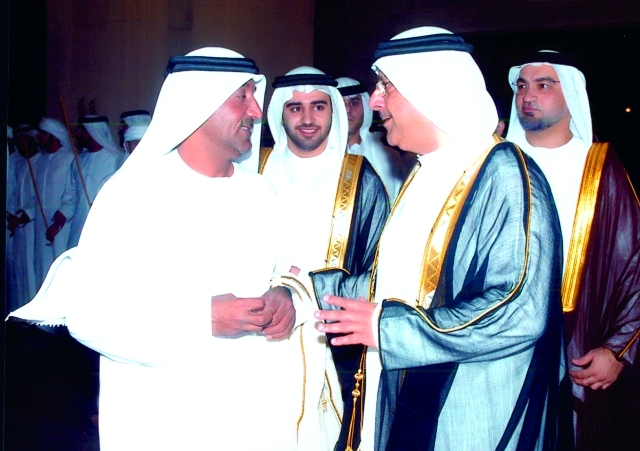 "أحمد بن سعيد وفي استقباله العريس ووالده ووالد العروس"